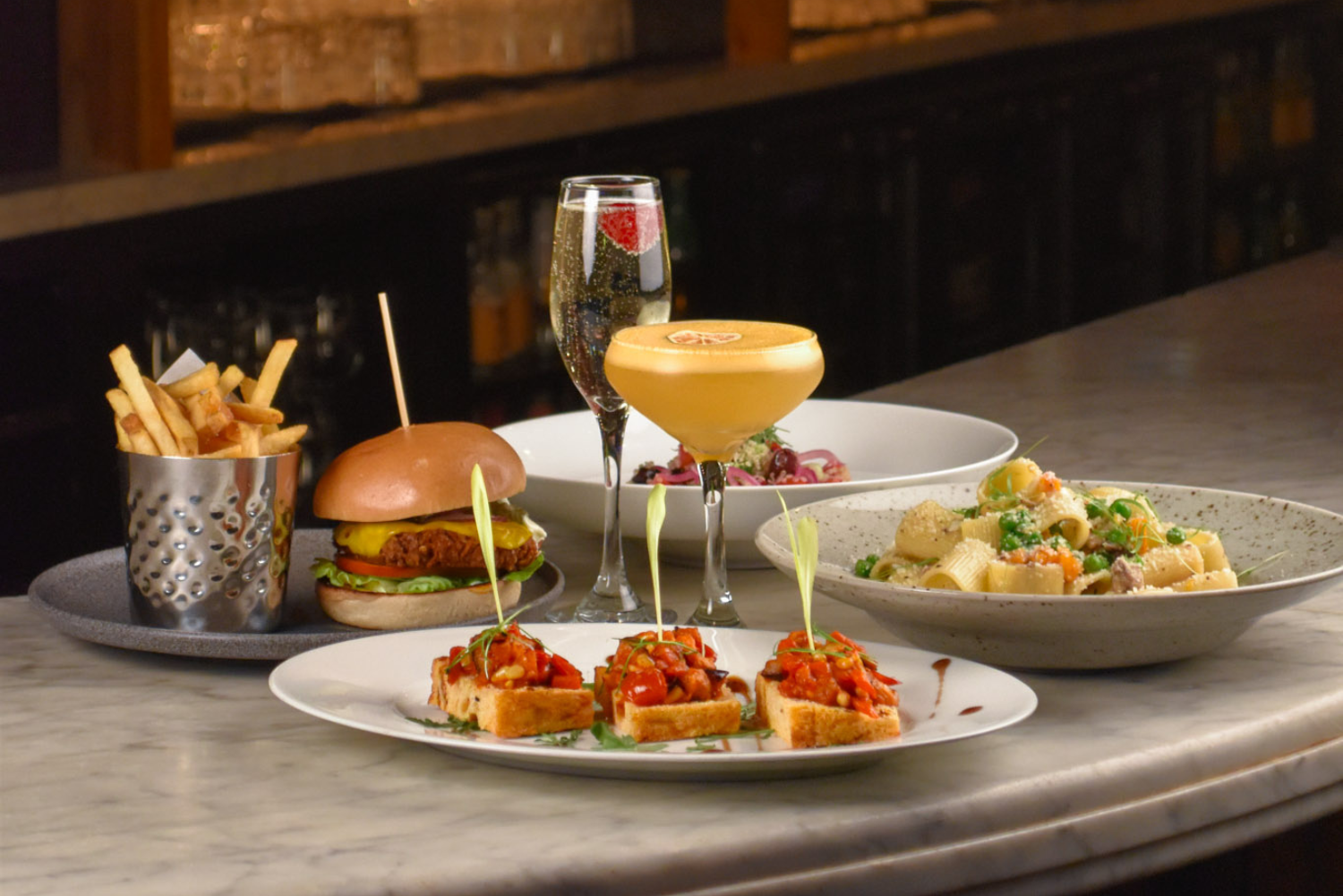 Food and cocktail on table